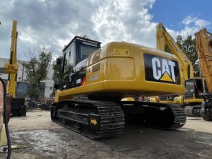 Caterpillar 320d2 koračajući bager